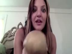 Erotic webcam vid with me flashing my cleavage and rubbing a fake penis